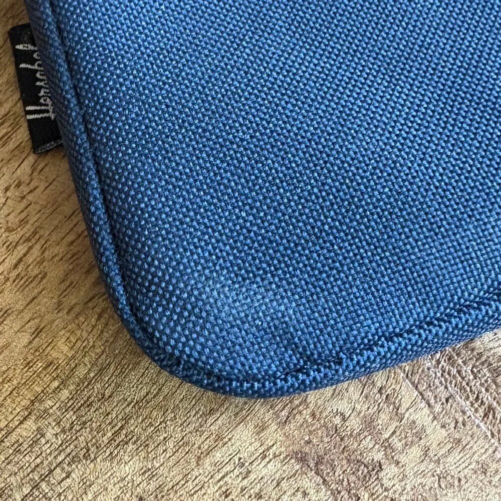Navy Blue/Turquoise Zip Top Cloth Tablet Case by The Herschel Supply Co.